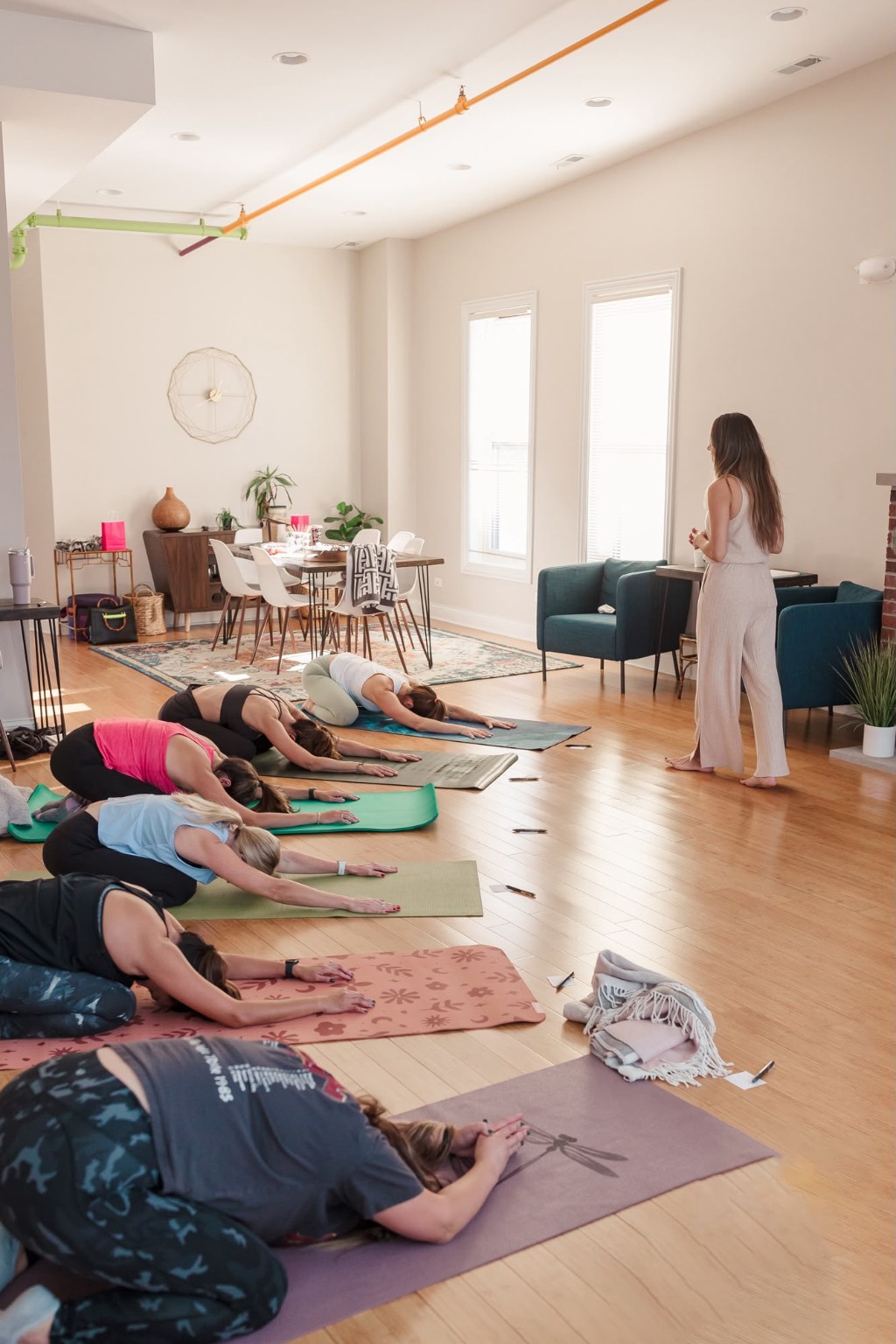 A guided yoga workshop in Studio B